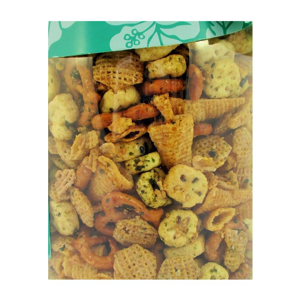 closeup of glazed furikake party mix with pretzels, rice crackers, and chex cereal