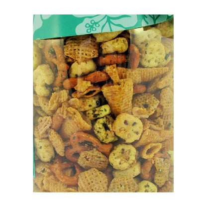 closeup of glazed furikake party mix with pretzels, rice crackers, and chex cereal