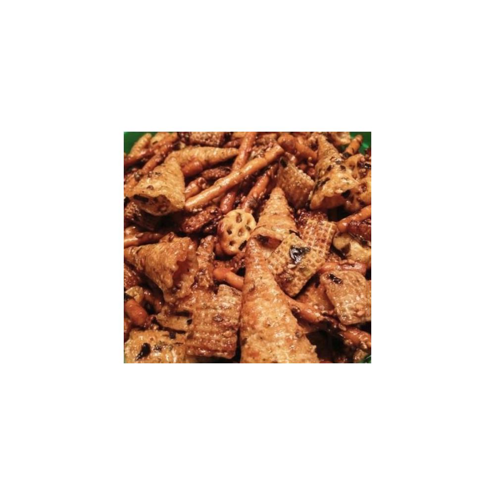 assorted furikake snack mix with cereal, pretzels, and seaweed seasoning inside a jar